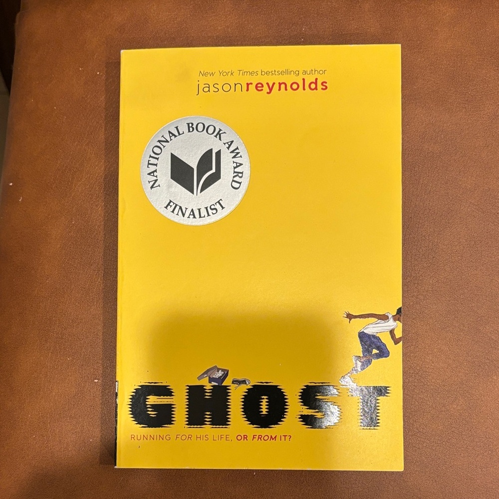 Ghost by Jason Reynolds - Yellow Book Cover